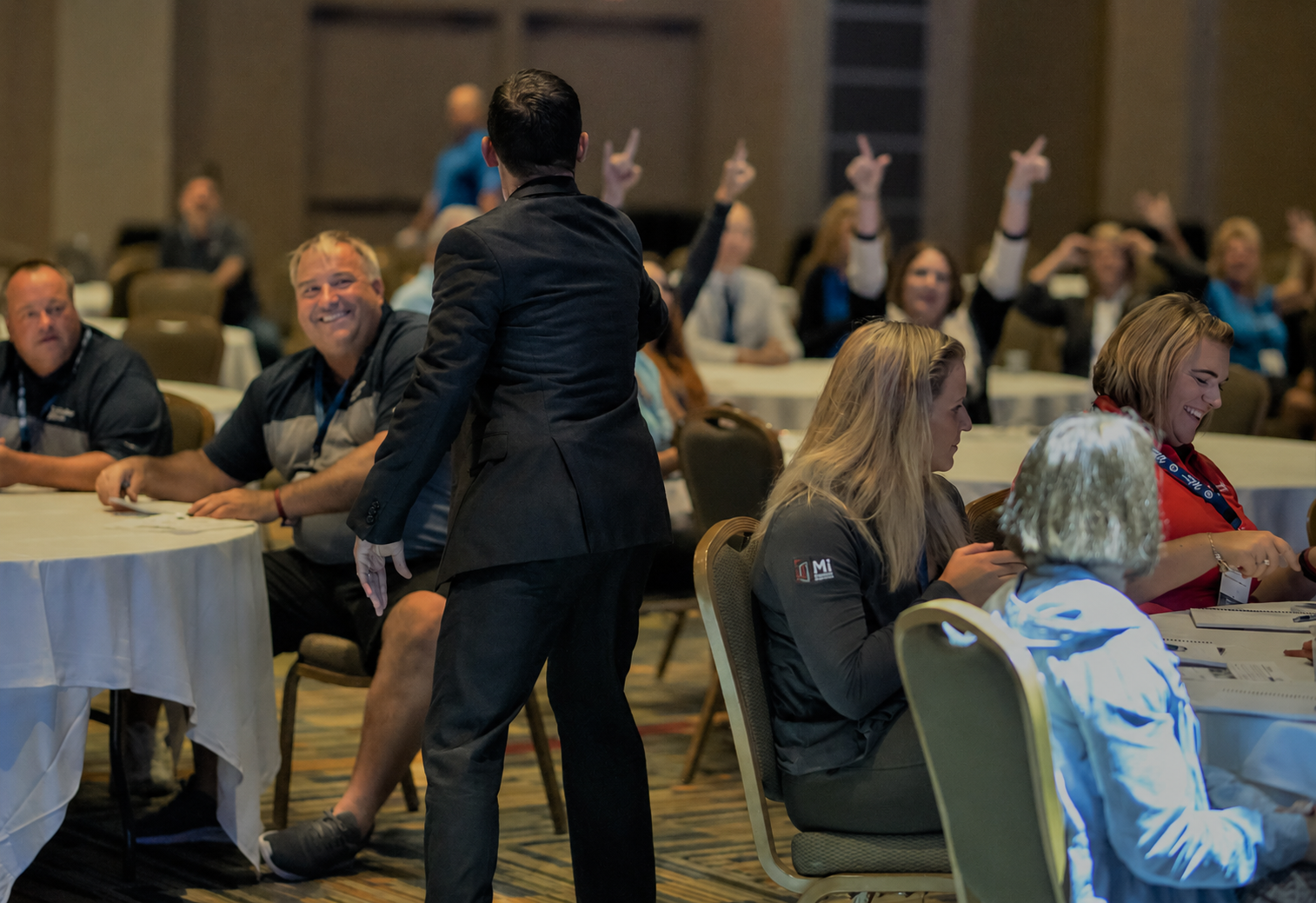 Dr. Kevin Snyder engaging an audience during a leadership keynote