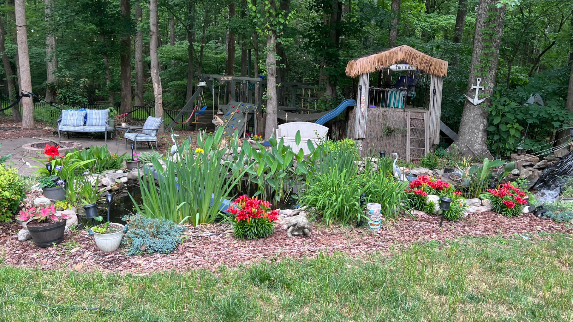 Kevin's backyard koi pond and tiki bar