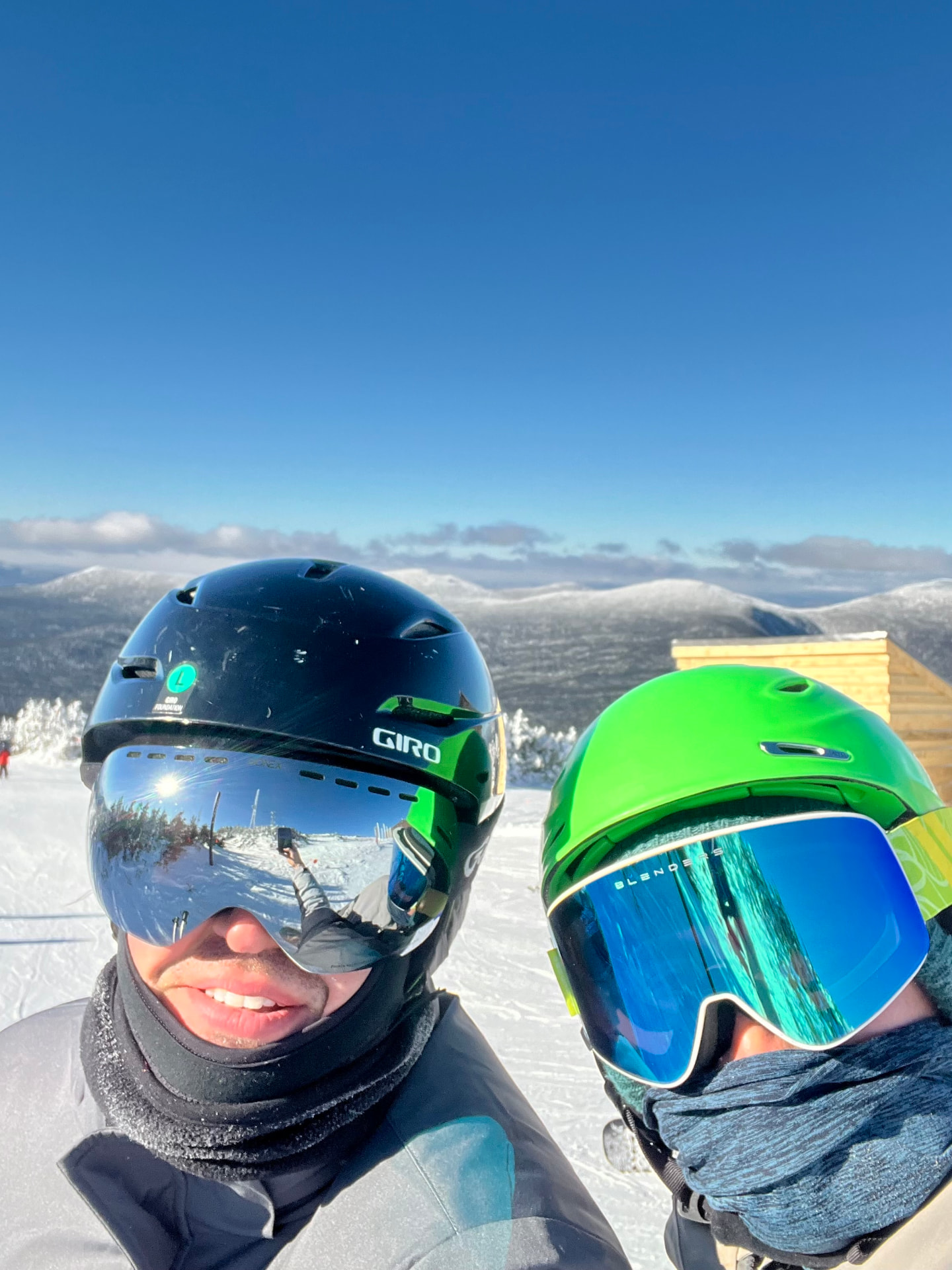 Kevin skiing on a mountain summit