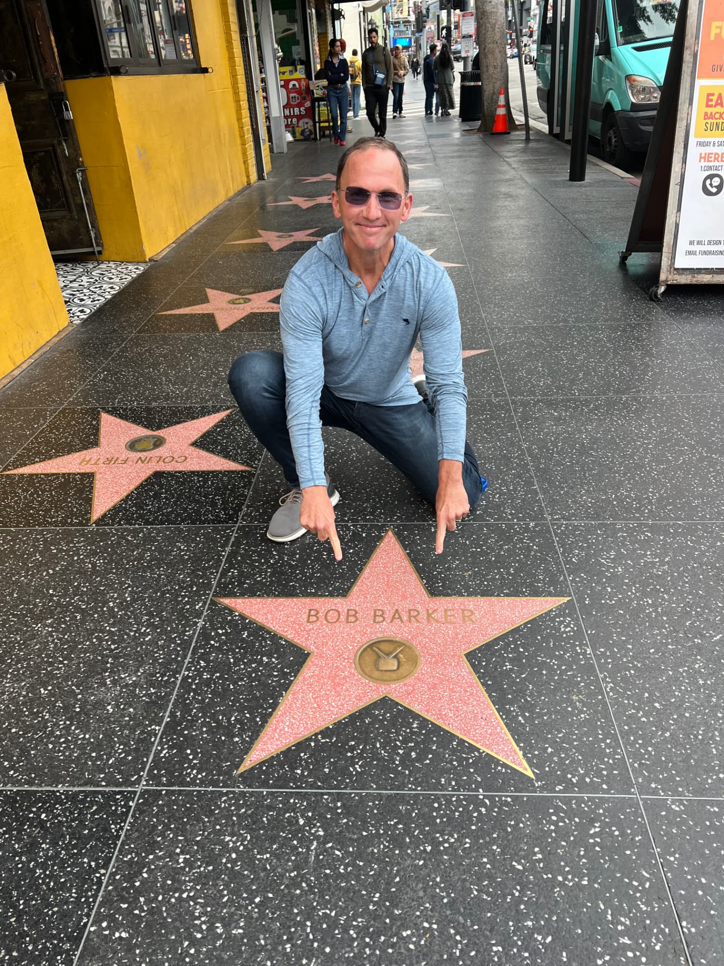 Kevin pointing at Bob Barker's Hollywood Walk of Fame star
